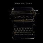 Secret Alphabets (Neon Orange Transparent Edition)