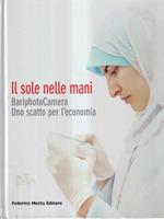 Il sole nelle mani. Bariphotocamera. Uno scatto per l'economia