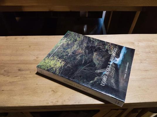 Uomo acquea e paesaggio - copertina