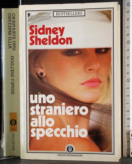 Uno straniero allo specchio - Sidney Sheldon - copertina
