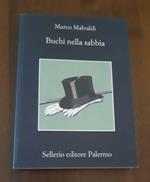 Buchi nella sabbia