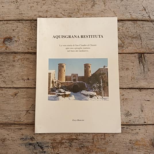 Aquisgrana Restituta. La vera storia di San Claudio al Chienti apre uno spiraglio inatteso nel buio del Medioevo - Enzo Mancini - copertina
