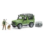 Land Rover Defender Station Wagon con forestale e cane