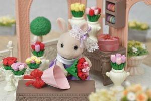La sorella maggiore Coniglietta Cioccolato e bouquet di fiori - 8