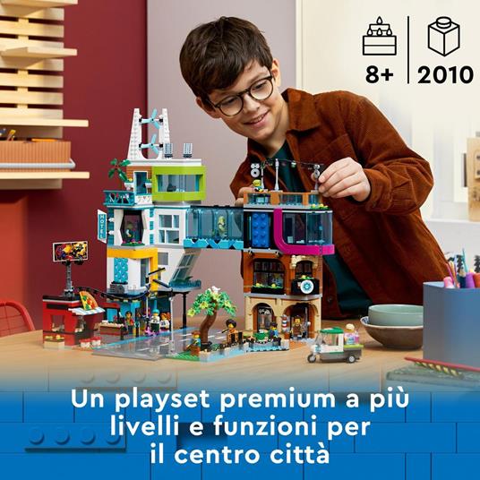 LEGO City 60380 Downtown, Modular Building Set con Negozio, Barbiere, Studio Blogging, Hotel, Discoteca e 14 Minifigure - 2