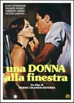 Una donna alla finestra