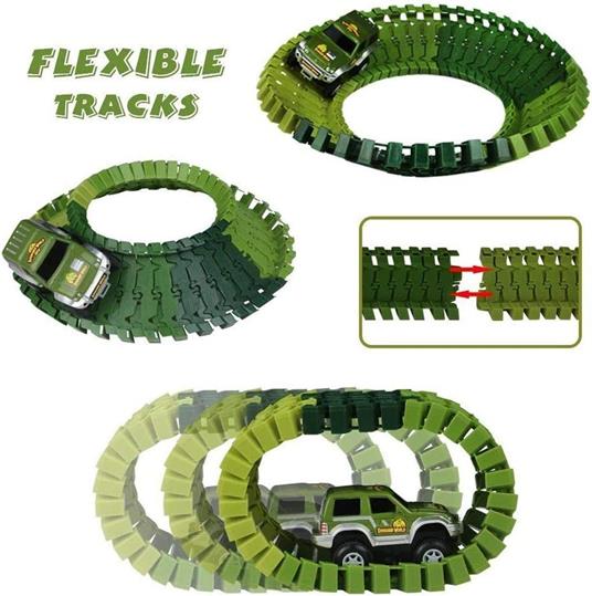 BAKAJI Playset Pista Macchinine Flessibile Parco dei Dinosauri Giocattolo per Bambini con Macchinina Luci LED a Batteria Dinosauro T-Rex Triceratopo e Altri Inclusi + Accessori Gioco Pista (142 pz) - 2
