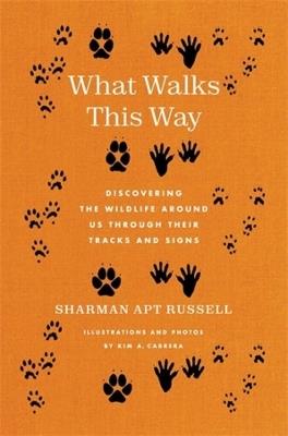 What Walks This Way: Discovering the Wildlife Around Us Through Their Tracks and Signs - Sharman Apt Russell - cover