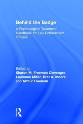Behind the Badge: A Psychological Treatment Handbook for Law Enforcement Officers - cover