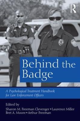 Behind the Badge: A Psychological Treatment Handbook for Law Enforcement Officers - cover