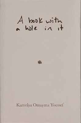 A book with a hole in it - Kamelya Youssef - cover
