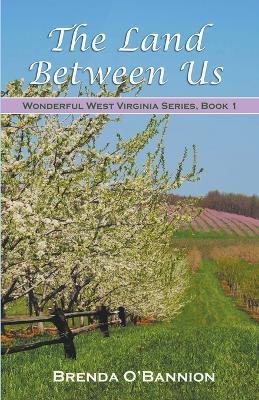 The Land Between Us - Brenda O'Bannion - cover