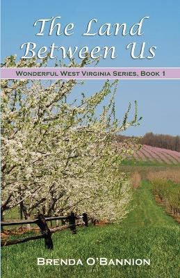 The Land Between Us - Brenda O'Bannion - cover