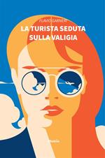 La turista seduta sulla valigia