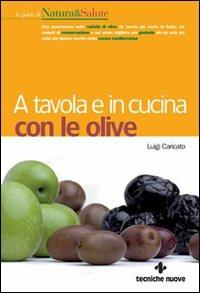 A tavola e in cucina con le olive. Ediz. illustrata - Luigi Caricato - copertina