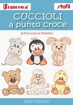 Cuccioli a punto croce