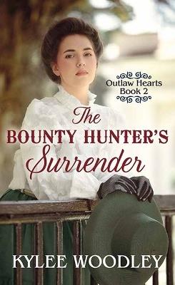 The Bounty Hunter's Surrender: Outlaw Hearts - Kylee Woodley - cover